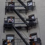 Photos from a live balcony concert in Harlem in September 2021
